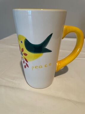 Baum White Ceramic Peace Mug with Yellow Handle and Bird Design